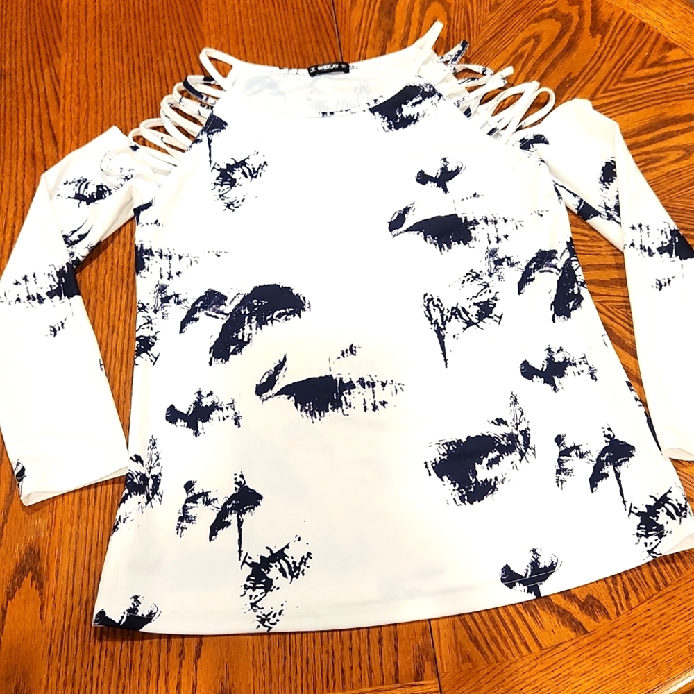Long sleeve blouse with shoulder cut outs
